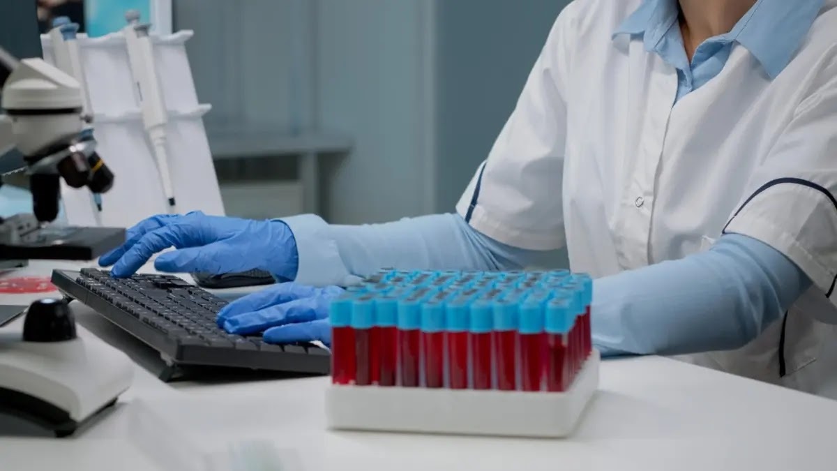 medical technologist analyzing blood samples for cross-matching and blood banking procedures in mfz clinical lab
